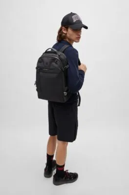 Multi-pocket backpack with stacked logo