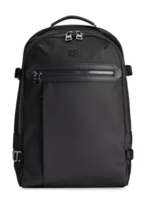 Multi-pocket backpack with stacked logo