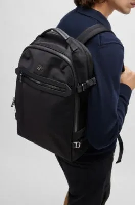 Multi-pocket backpack with stacked logo