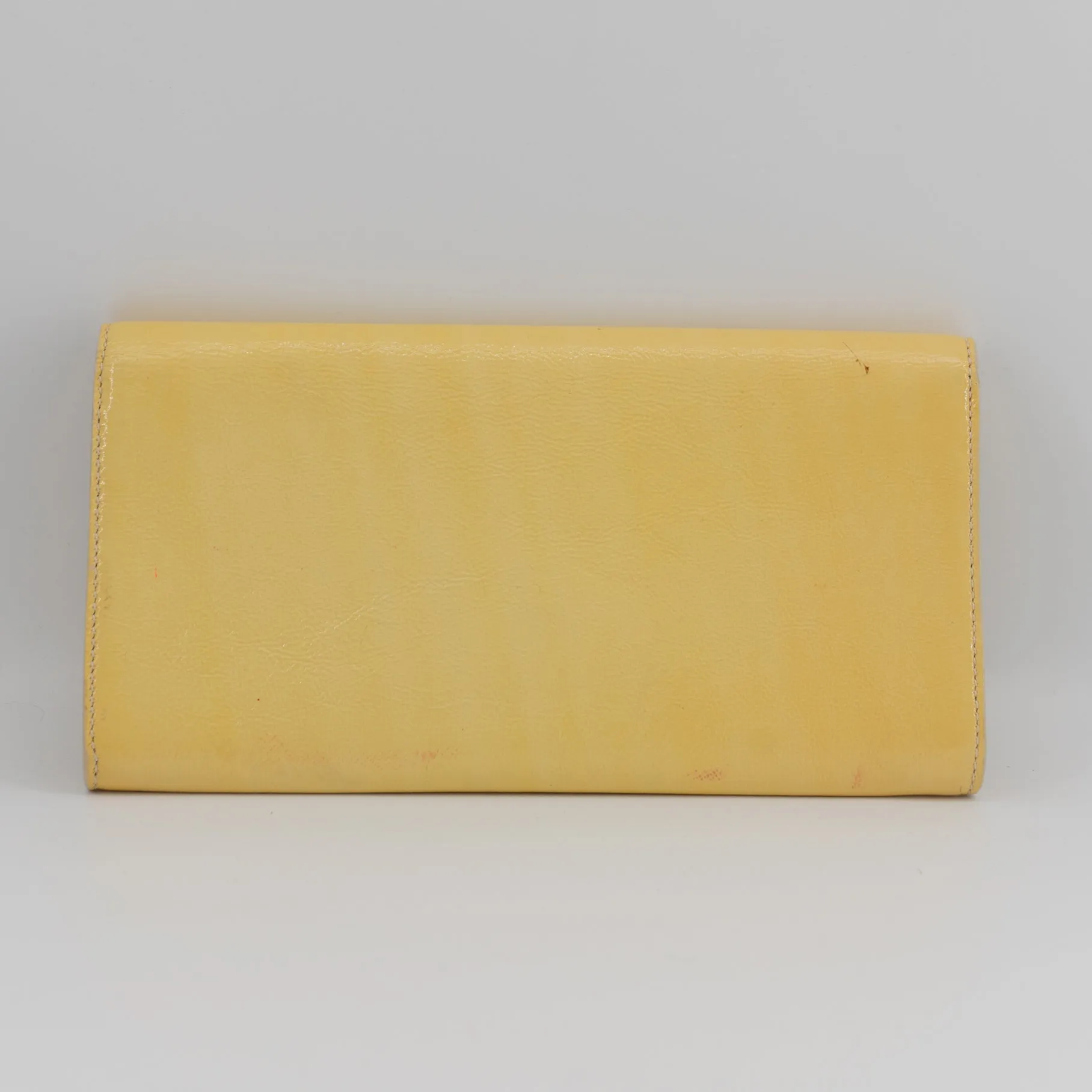 Yves Saint Laurent yellow leather clutch TWS pop