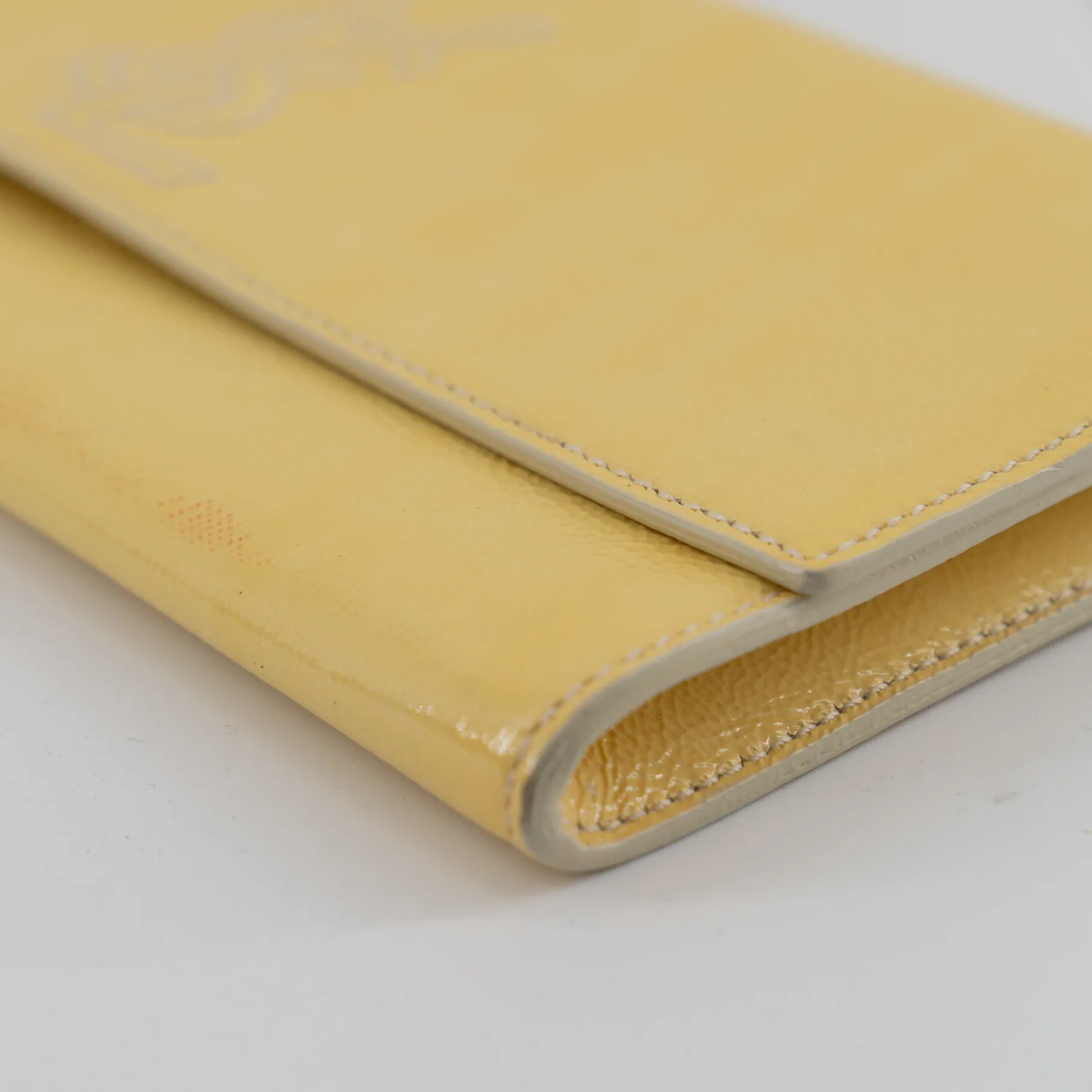 Yves Saint Laurent yellow leather clutch TWS pop