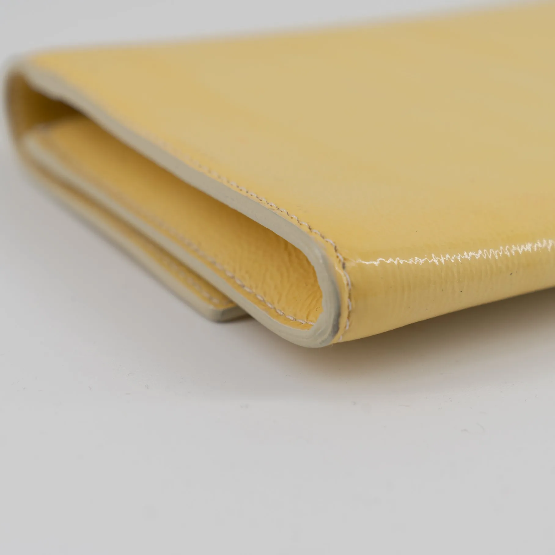 Yves Saint Laurent yellow leather clutch TWS pop